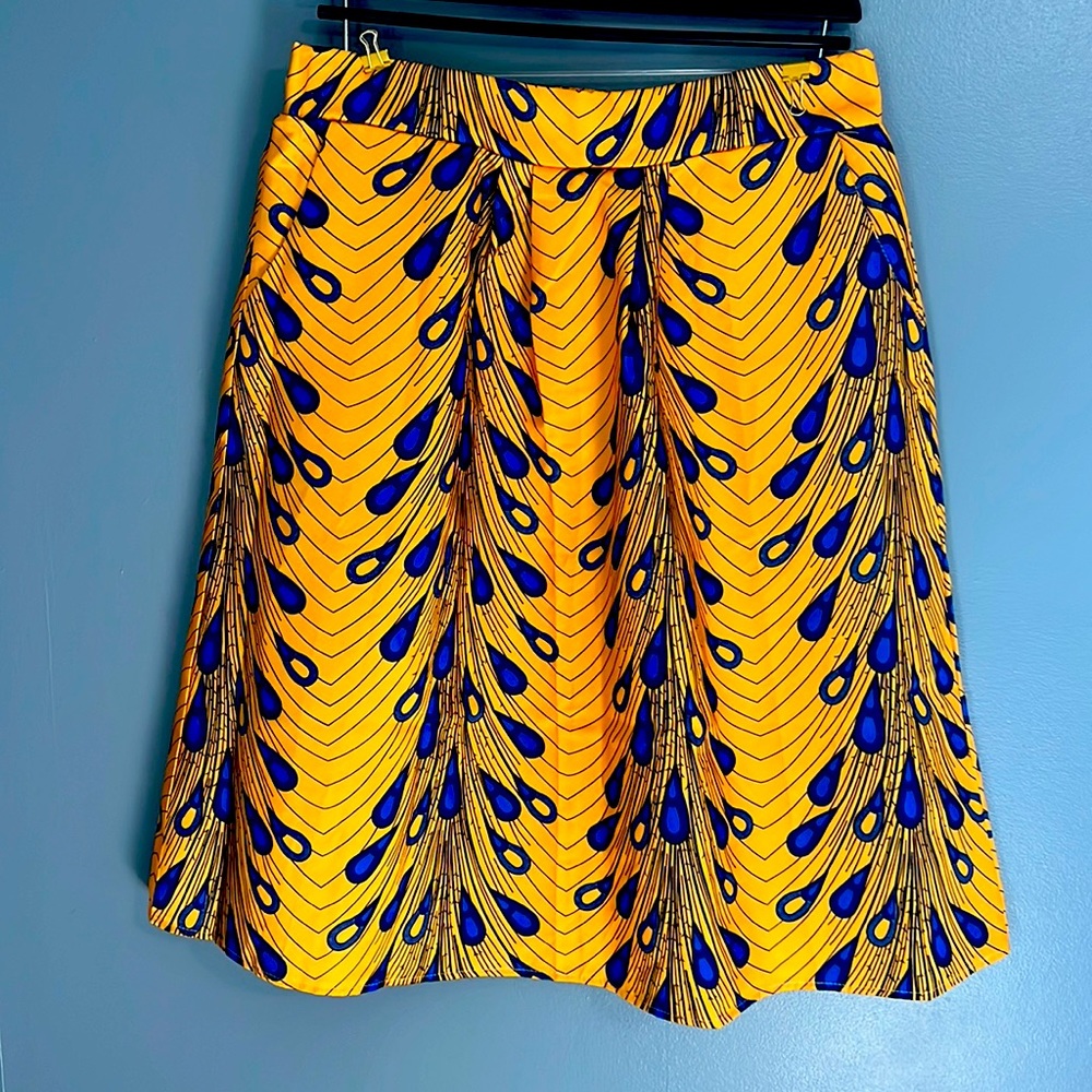 Afibi pleated peacock pleated skirt with pockets